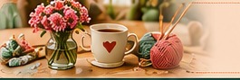 Table conviviale avec café, fleurs et laine